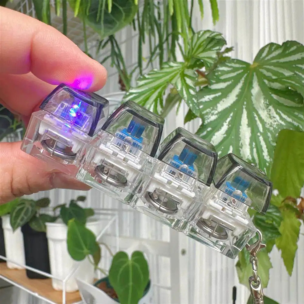 Nuevo llavero con teclado para aliviar el estrés y ansiedad, botones de cuatro dedos, ideal para la oficina, el hogar, adultos y niños.