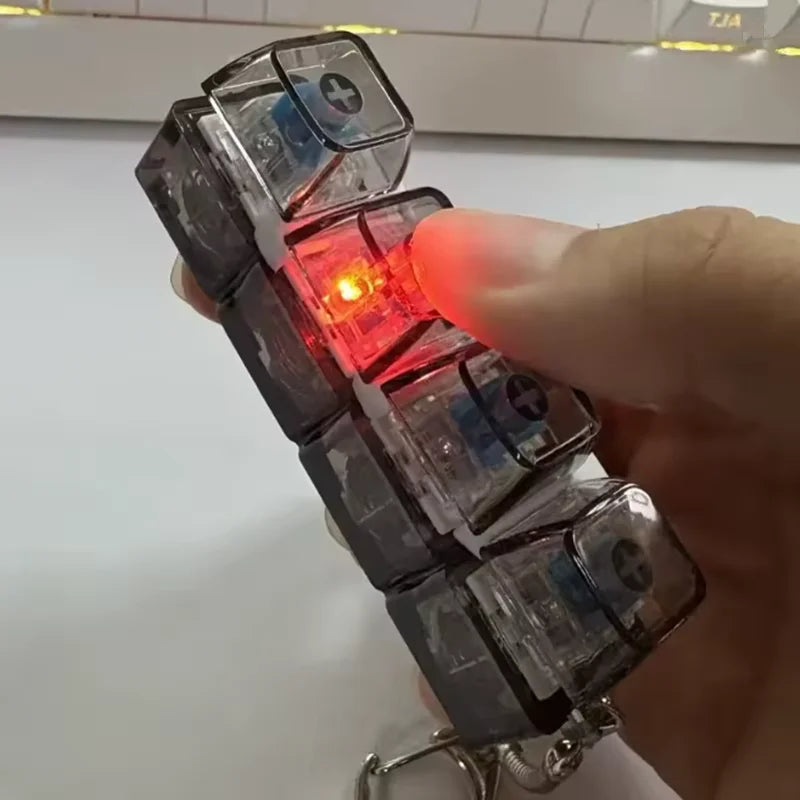 Nuevo llavero con teclado para aliviar el estrés y ansiedad, botones de cuatro dedos, ideal para la oficina, el hogar, adultos y niños.